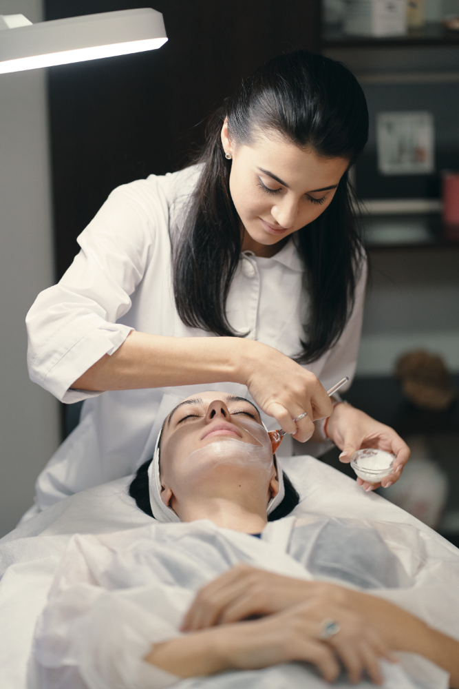 woman getting facial treatments
