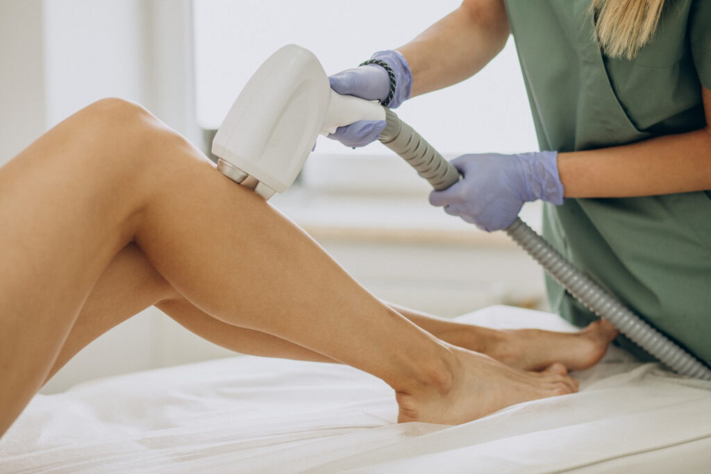 woman getting laser hair removal treatment